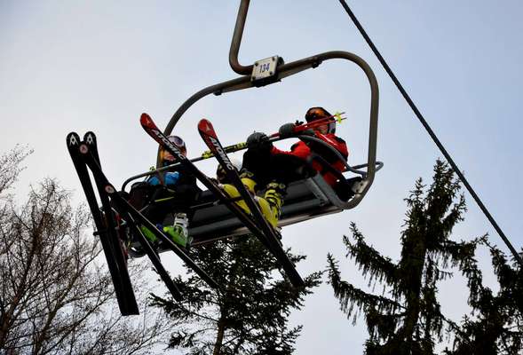Ski lift with beautiful views over the winter resort Moninec