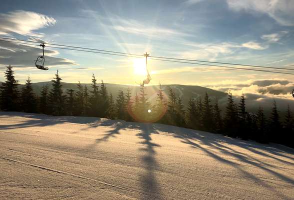 Skiing and snowboarding in the winter resort Spindleruv mlyn