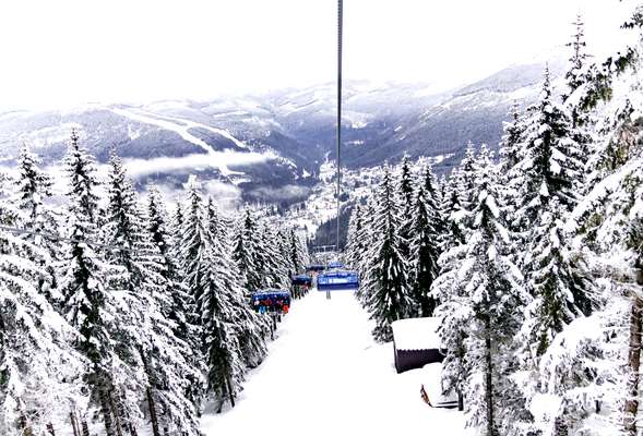 Skiing and snowboarding in the winter resort Spindleruv mlyn