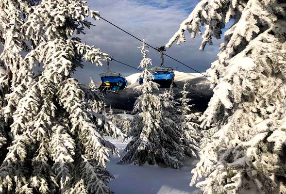 Skiing and snowboarding in the winter resort Spindleruv mlyn