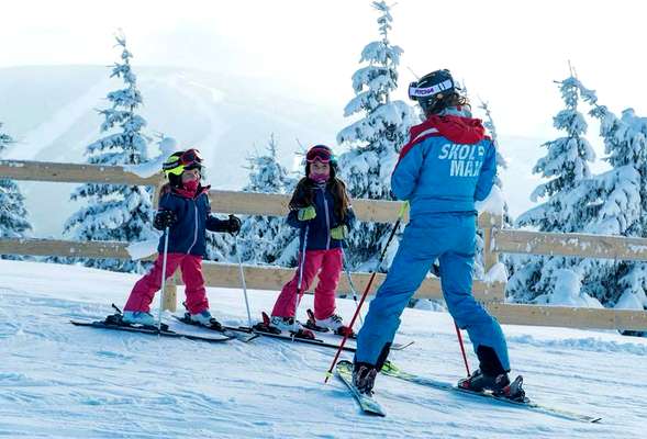 Skiing and snowboarding in the winter resort Spindleruv mlyn