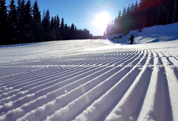 Skiing and snowboarding in the winter resort Spindleruv mlyn