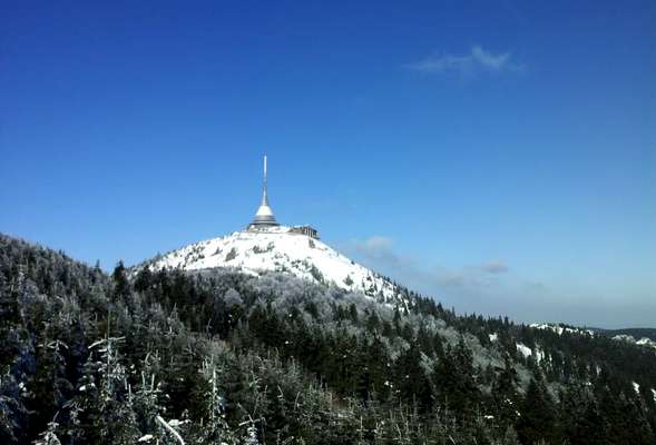Jested is a famous hill overlooking the city Liberec, with the iconic TV tower building with the restaurant on the top.