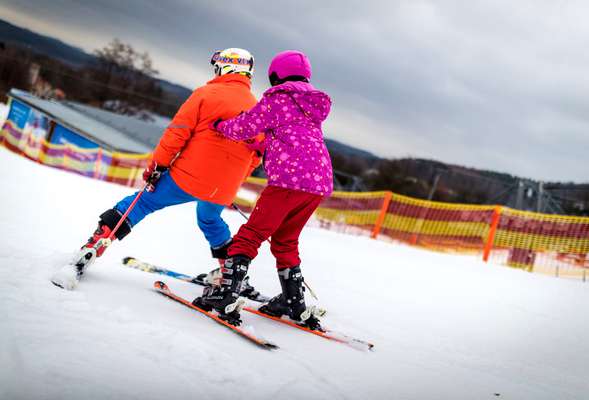 Learning skiing in the winter resort Moninec