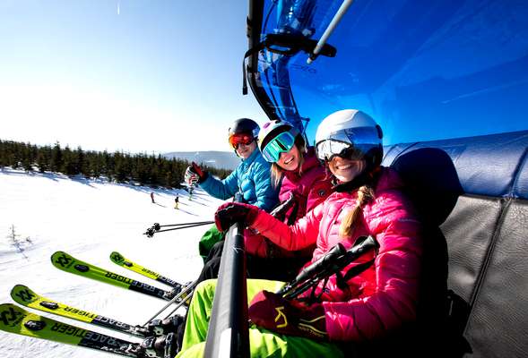 Skiing and snowboarding in the winter resort Spindleruv mlyn